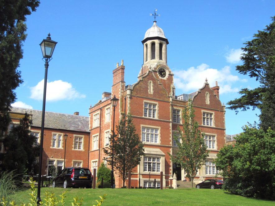 Tredington Park (foHandsome red brick building with stone dressings; 2-storey wings and a 3-storey entrance with cupola clock-tower above | Image courtesy of Anne Langley