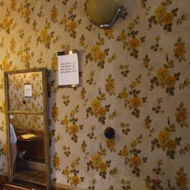 The wallpaper. Of its period, but in remarkably good condition. | Photo by Benjamin Earl