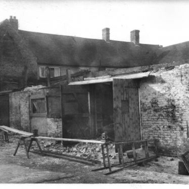 Demolishing the Garage and Coal Store at the Bull Inn, Southam in 1965 | Image courtesy of John Slack