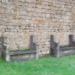 A pair of stone benches set within or up against a building on Sandpits Road, Middle Tysoe