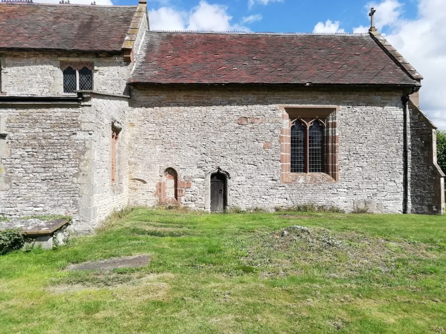 Grey stone building with red roof, possible site of minster church in Ufton | Image courtesy of Gary Stocker, July 2020.