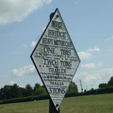 Signposts on canal bridge