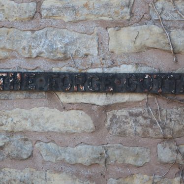 Close up of name 'The Forge Cottage' in black iron | Image courtesy of Gary Stocker, August 2020
