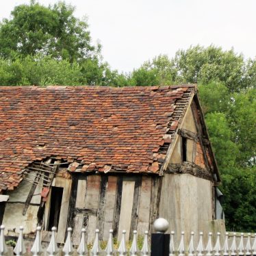 Timber-framed building with tiled roof in poor condition | Image courtesy of Anne Langley