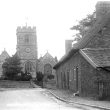 Harborough Magna.  Church and row of terraced houses