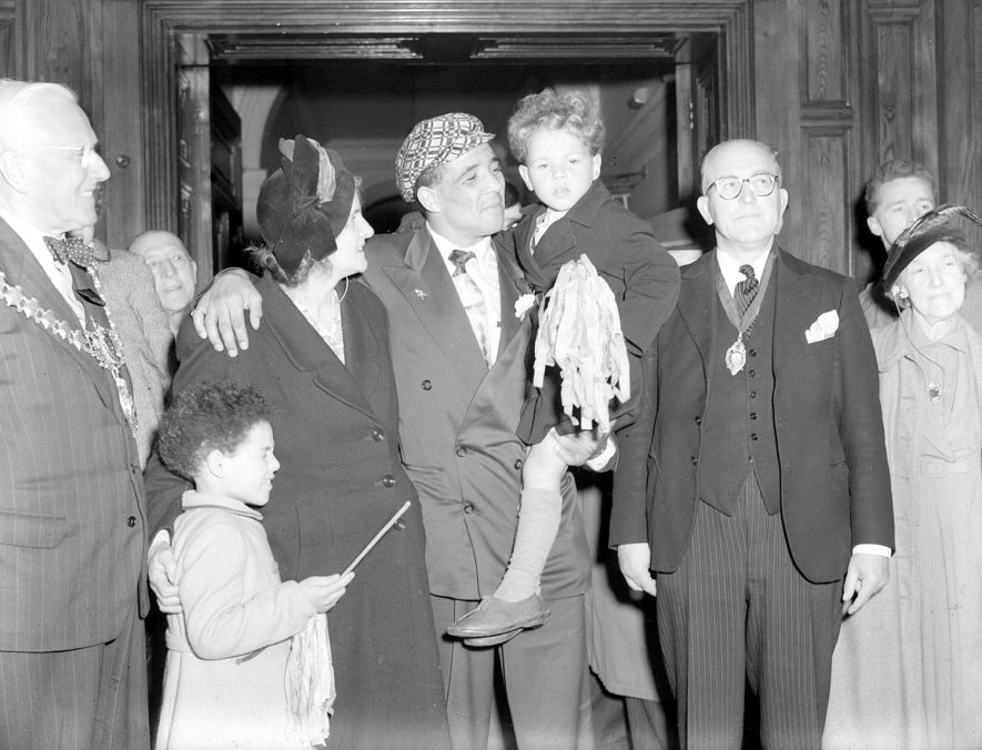 Randolph Turpin with his mother and his sons and the Mayor, Alderman O.R. Davidson.  1951 |  IMAGE LOCATION: (Warwickshire County Record Office) PEOPLE IN PHOTO: Turpin, Randolph, Turpin as a surname, Davidson, Ald O R, Davidson as a surname