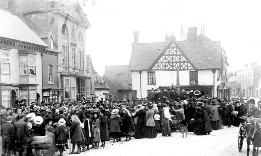 Celebration of the coronation, of King George V. in the High Street outside the Guildhall, Henley in Arden.  1910 |  IMAGE LOCATION: (Warwickshire County Record Office)