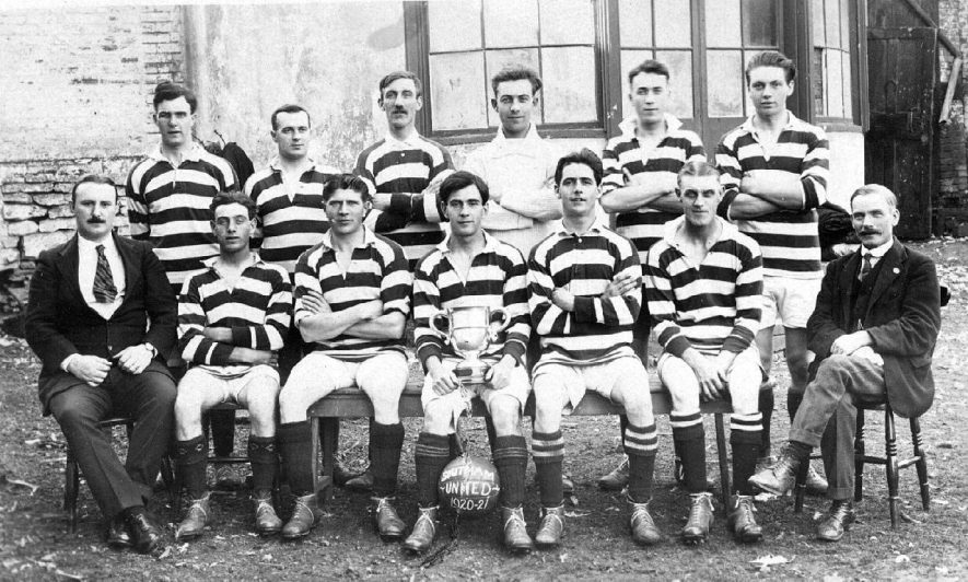 Southam United, 1920-1; group photograph showing the team  with a football and a trophy.  1921 |  IMAGE LOCATION: (Warwickshire County Record Office)