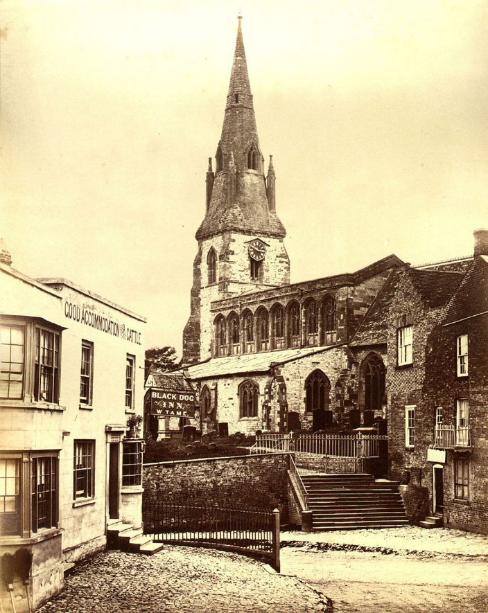 Market Hill, Southam, showing the Church and the Black Dog Inn.  1860s |  IMAGE LOCATION: (Warwickshire County Record Office)