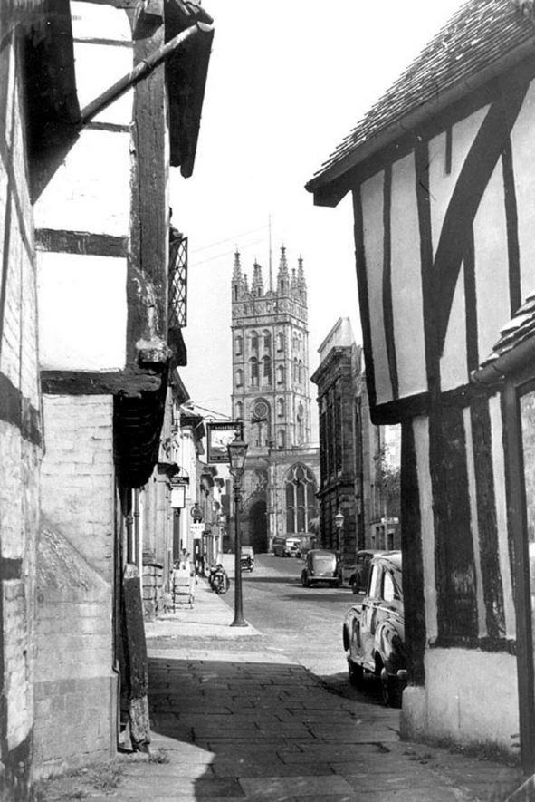 View of St Mary's Church up Church Street, Warwick.  1950s |  IMAGE LOCATION: (Warwickshire County Record Office)