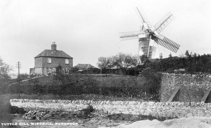 Tuttle Hill Windmill, Nuneaton.  1920s. Also known as Tuttle Hill, Caledecote.

Red brick tower built in 1821. The only one which is cemented over. Had 4 common sails & 3 pairs stones. Rebuilt 1905 (after storm) with iron machinery & 5 sails. Ceased work after storm damage in 1936.

Retains much machinery, but used as astore. |  IMAGE LOCATION: (Warwickshire County Record Office)
