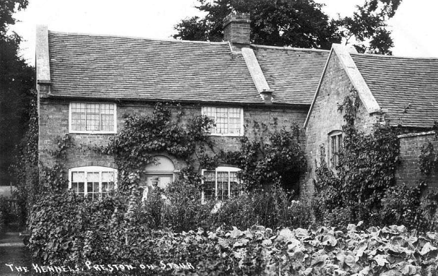 Estate buildings at the Kennels, Preston on Stour,  with a productive cottage garden.  1900s |  IMAGE LOCATION: (Warwickshire County Record Office)