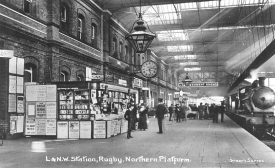 North platform. L.N.W.R. station,  Rugby,   a train standing at the platform.  110s |  IMAGE LOCATION: (Warwickshire County Record Office)