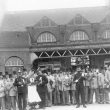 Rugby.  Comic Band outside the Great Central Railway Station