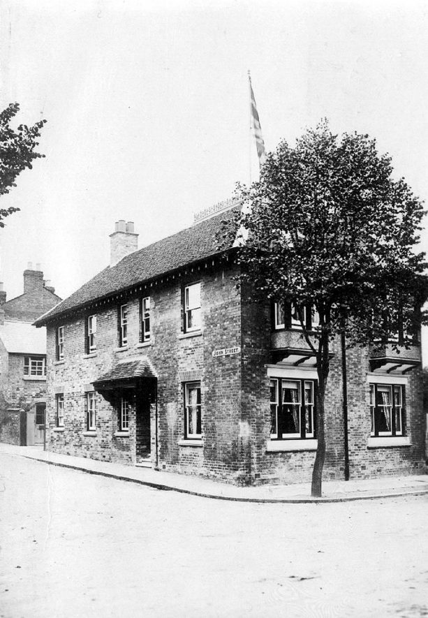 A house at the corner of John Street and Guild Street, Stratford upon Avon.  1900s |  IMAGE LOCATION: (Warwickshire County Record Office)