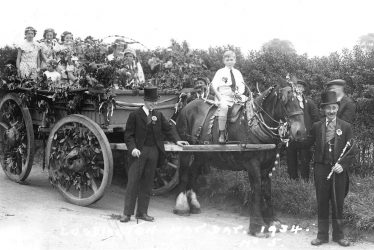 Luddington.  May Day, a decorated cart