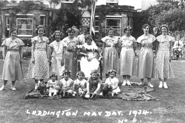 Luddington.  May Day, a group of celebrants