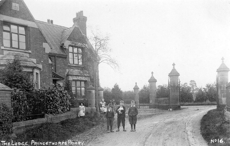 The Priory Lodge, Princethorpe, with gateway beyond.  Children standing in drive.  1900s |  IMAGE LOCATION: (Warwickshire County Record Office)