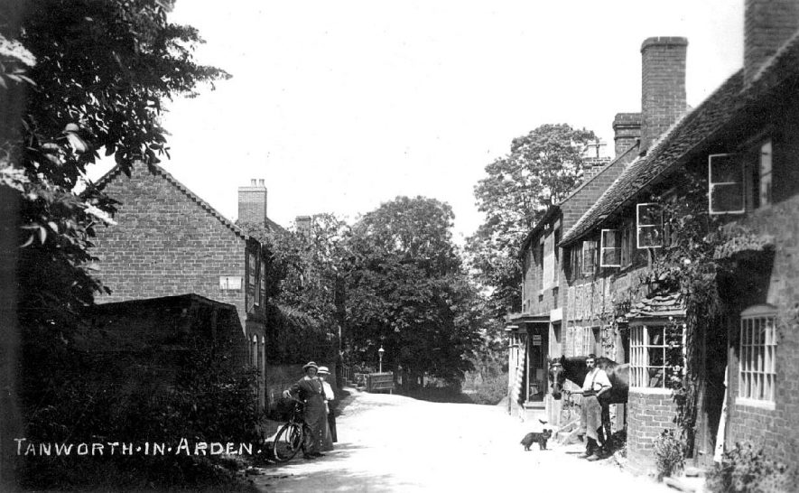 Man with his horse and dog and two ladies with their bicycle in Tanworth-in-Arden.  1900s |  IMAGE LOCATION: (Warwickshire County Record Office)