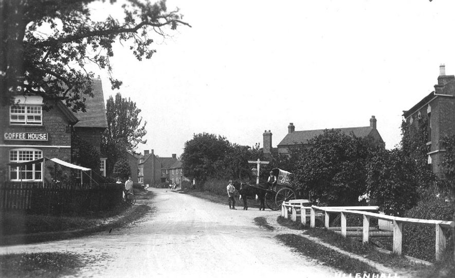 Village view of Ullenhall with Watery Lane to the right and Church Road to the left. The Winged Spur public house is seen in the background.  1910s |  IMAGE LOCATION: (Warwickshire County Record Office)
