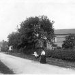 Ullenhall.  Lady with baby in a pram