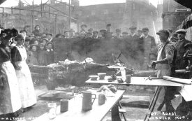 Ox roast probably during a Mop, Warwick.  1920s |  IMAGE LOCATION: (Warwickshire County Record Office)