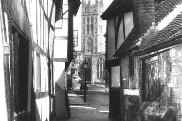 Warwick.  St Mary's Church Tower from Oken's passage