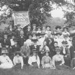Warwick.  Group of men and women with religious banner