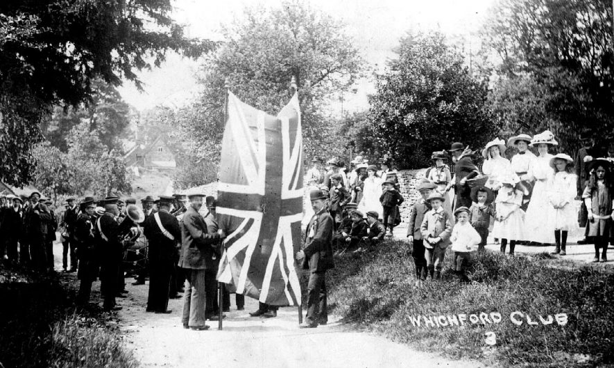 Wichford Club, apparently preparing for a procession.  1910s |  IMAGE LOCATION: (Warwickshire County Record Office)