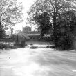 Wolston.  Floods in front of the Church