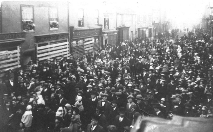 Crowds in Long Street, Atherstone, at the annual Shrove Tuesday football match.  1910s |  IMAGE LOCATION: (Warwickshire County Record Office)