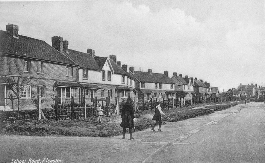 School Road, Alcester, showing two girls playing with a hockey stick.  1930s |  IMAGE LOCATION: (Warwickshire County Record Office)