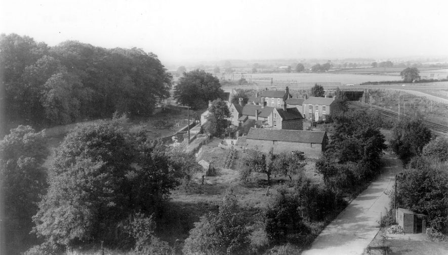 View of canal and railway with cottages, Atherstone.  1960s |  IMAGE LOCATION: (Warwickshire County Record Office)