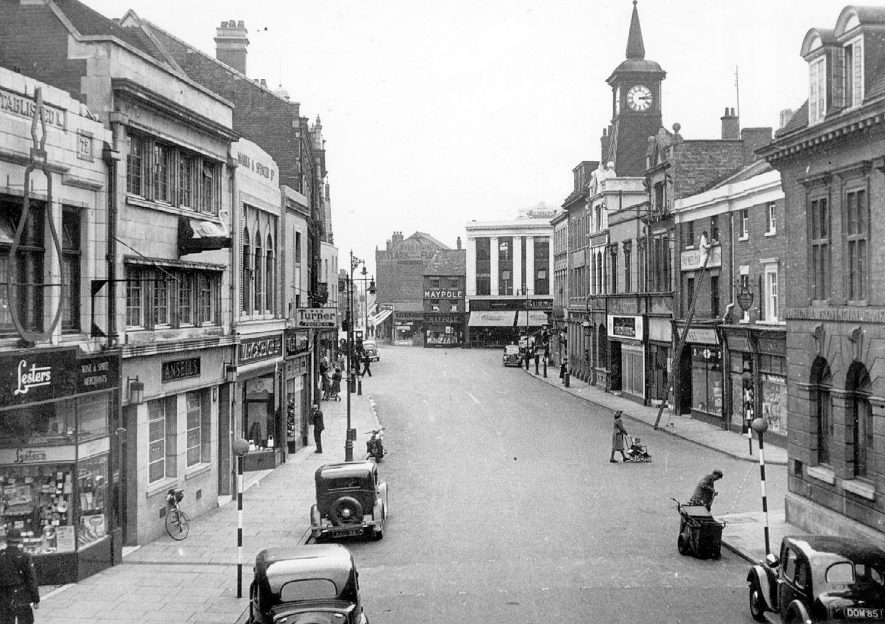 Market Place, Nuneaton.  1950s

Workman with ladder and rubbish collector. |  IMAGE LOCATION: (Warwickshire County Record Office)
