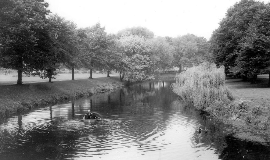 Child boating on the water at Riversley Park.  1960s |  IMAGE LOCATION: (Warwickshire County Record Office)