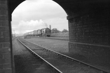Nuneaton.  Gipsy Lane, bridge with express train