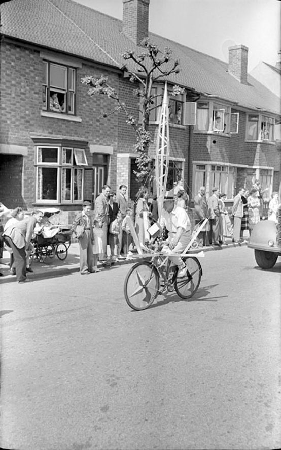 The Skylon Cyclist in Manor Court Road, Nuneaton.  (The Skylon was a feature of the Festival of Britain in 1951).  1951 |  IMAGE LOCATION: (Warwickshire County Record Office)