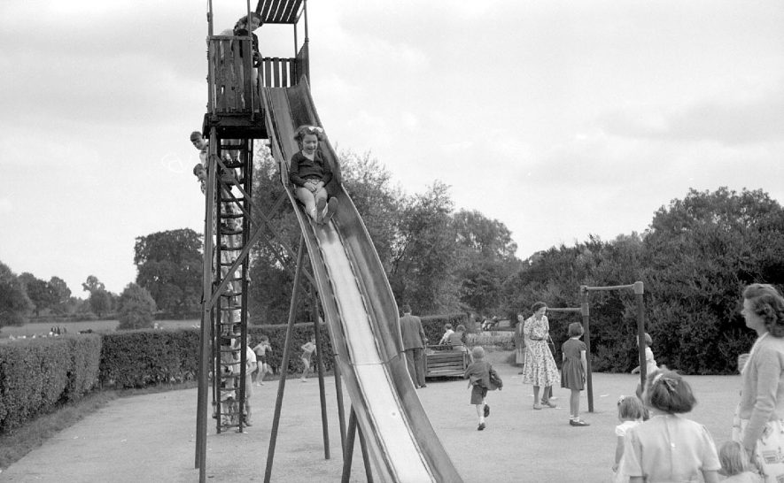 Child on a slide in a park in Warwick.  1952 |  IMAGE LOCATION: (Warwickshire County Record Office)
