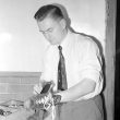 Nuneaton.  John Deeming, cleaning his boots
