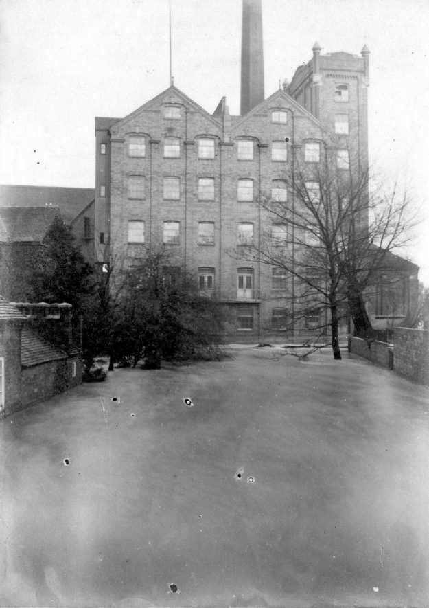 The flour mill and river taken from Bridge Street in the 1900 floods, Nuneaton.  1900 |  IMAGE LOCATION: (Nuneaton Library)