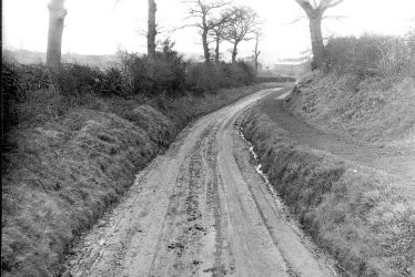 Galley Common.  Lane with road works notice