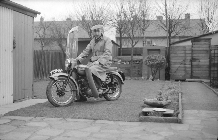 Mr Reg Bull sitting astride his new Triumph 200cc Tiger Cub motorcycle which he purchased on January 2nd 1958 from Brandish's of Coventry. |  IMAGE LOCATION: (Warwickshire County Record Office) PEOPLE IN PHOTO: Bull, Reg, Bull as a surname