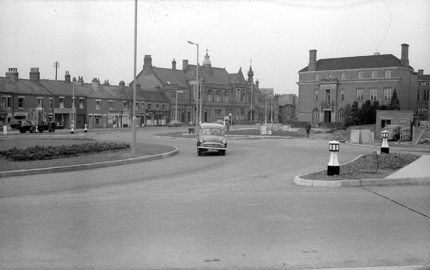 Scene in the Coton Road,  looking towards the Council House with the newly constructed traffic islands.  1962 |  IMAGE LOCATION: (Warwickshire County Record Office)