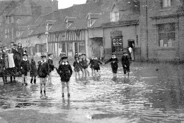 Coleshill.  High Street, flooding