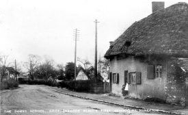 A roadside cottage opposite to the gates of Griff where Mrs Moore kept a dame's school. This was George Eliot's first school.  1900s |  IMAGE LOCATION: (Warwickshire County Record Office)