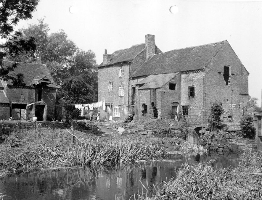 Alders Mill at Atherstone, showing the dilapidated state of the building, although the left hand side is still inhabited.  1950s |  IMAGE LOCATION: (Warwickshire Museums. Photographic Collections.)