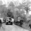 Arbury.  Newdegate family leaving Arbury Park in a car