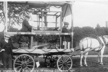 Nuneaton.  One hundred year old hand loom on a cart
