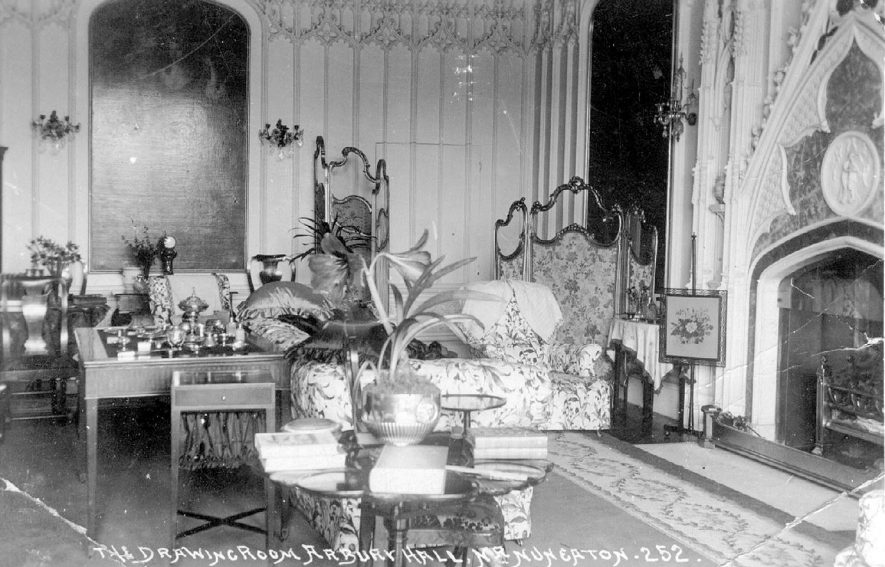 Furniture and furnishings in the drawing room at Arbury Hall, near Nuneaton.  1900s |  IMAGE LOCATION: (Warwickshire County Record Office)