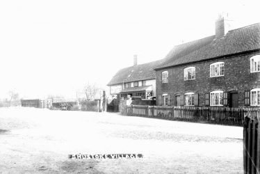 Shustoke.  Village street and cottages